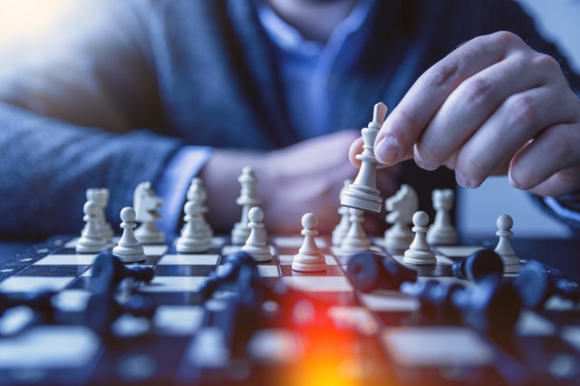 person-playing-chess-1040157
